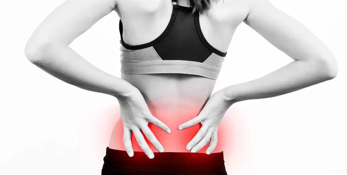 Pain in the lower back, which can be eliminated with exercises and correct body position